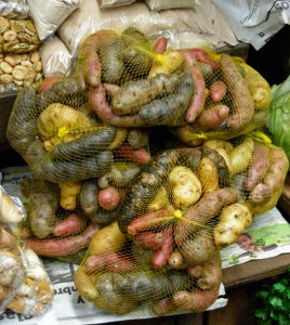 Mixed bags of papas nativas at Chiloé market