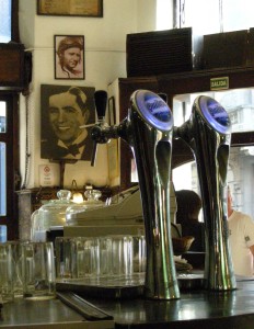 The smile of Gardel, still an essential of bar-room furniture